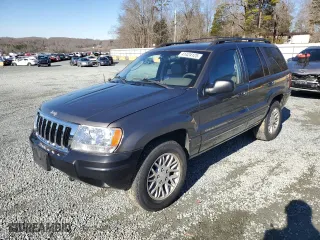 2004 Jeep Grand Cherokee Limited with VIN 1J4GW58SX4C246505, listed as a Copart auction lot 41424125 with 198,246 mi miles and Salvage Title. Bid and sale history available at carsss.com. Image 1.