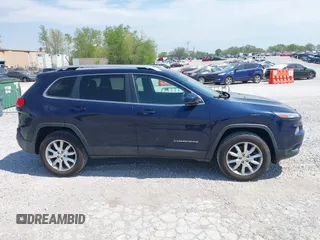 2015 Jeep Cherokee Limited z VIN 1C4PJMDS0FW551615, wystawiony jako IAAI lot #42080944 z przebiegiem 175 793 mil mil oraz . Historia ofert i sprzedaży dostępna na DreamBid. Obrazek 13.