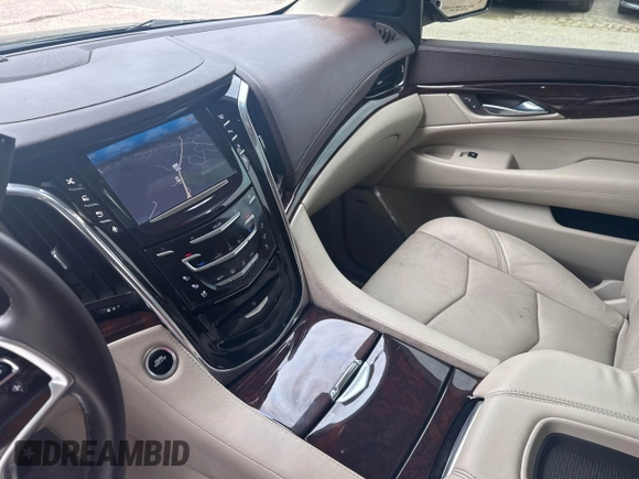 2015 Cadillac Escalade ESV Premium z VIN 1GYS4JKJ1FR272533, wystawiony jako IAAI lot #42461108 z przebiegiem 227 892 mil mil oraz . Historia ofert i sprzedaży dostępna na DreamBid. Obrazek 6.