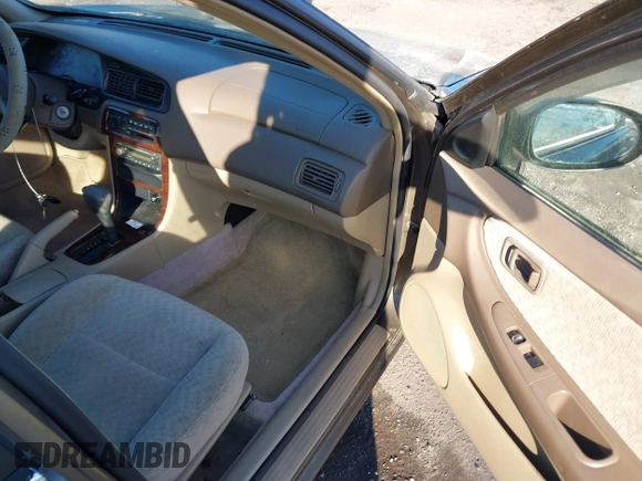 2000 Nissan Altima XE with VIN 1N4DL01D8YC235627, listed as a IAAI auction lot 41662564 with 79,409 mi miles and . Bid and sale history available at DreamBid. Image 5.