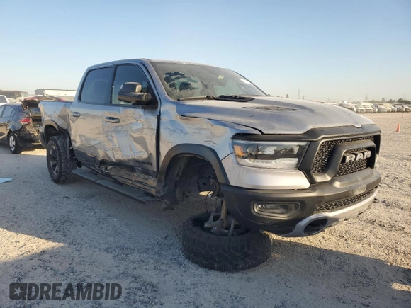 2020 Ram 1500 Rebel with VIN 1C6RRELT7LN299176, listed as a Copart auction lot 76778334 with 70,059 mi miles and Salvage title. Bid and sale history available at DreamBid. Image 4.