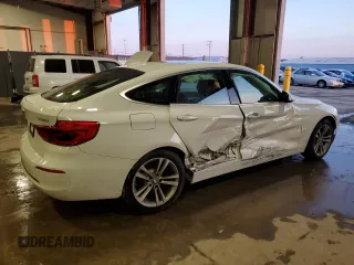2018 BMW 3 Series 330i xDrive with VIN WBA8Z9C5XJG828289, listed as a Copart auction lot 42535195 with 57,623 mi miles and Salvage Title. Bid and sale history available at carsss.com. Image 3.