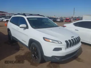 2014 Jeep Cherokee Latitude with VIN 1C4PJMCS7EW298115, listed as a IAAI auction lot 41605052 with 184,773 mi miles and . Bid and sale history available at DreamBid. Image 1.