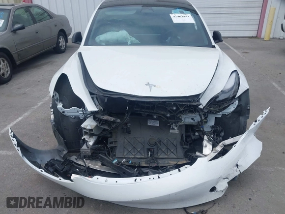 2023 Tesla Model 3 with VIN 5YJ3E1EA2PF417959, listed as a IAAI auction lot 42463853 with 22,736 mi miles and . Bid and sale history available at DreamBid. Image 13.