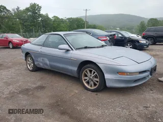 1995 Ford Probe z VIN 1ZVLT20A6S5154983, wystawiony jako IAAI lot #42301574 z przebiegiem 128 515 mil mil oraz . Historia ofert i sprzedaży dostępna na DreamBid. Obrazek 1.