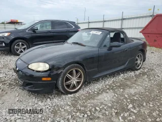 2003 Mazda MX-5 Miata Cloth with VIN JM1NB353630309576, listed as a Copart auction lot 62315635 with 122,915 mi miles and Clean title. Bid and sale history available at DreamBid. Image 1.