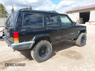 2000 Jeep Cherokee z VIN 1J4FF48S7YL153811, wystawiony jako IAAI lot #42098752 z przebiegiem 213 988 mil mil oraz . Historia ofert i sprzedaży dostępna na DreamBid. Obrazek 4.