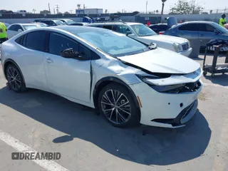 2024 Toyota Prius LE with VIN JTDACAAU1R3015637, listed as a IAAI auction lot 42077565 with 1 mi miles. Bid and sale history available at carsss.com. Image 1.