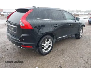 2016 Volvo XC60 T5 Drive-E Premier z VIN YV440MDK6G2907836, wystawiony jako IAAI lot #42133307 z przebiegiem 78 109 mil mil oraz . Historia ofert i sprzedaży dostępna na DreamBid. Obrazek 4.