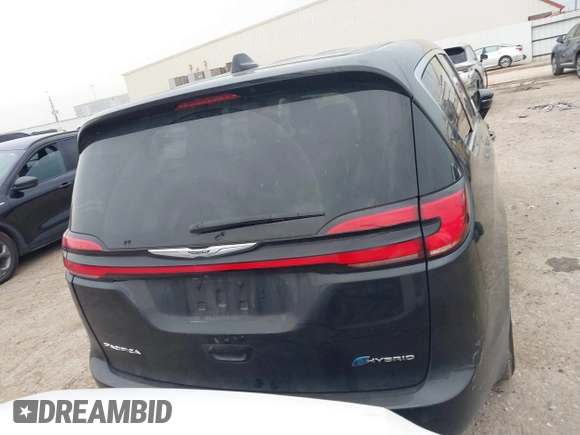 2023 Chrysler Pacifica Hybrid Touring L z VIN 2C4RC1L77PR631132, wystawiony jako IAAI lot #42391834 z przebiegiem 61 868 mil mil oraz . Historia ofert i sprzedaży dostępna na DreamBid. Obrazek 15.