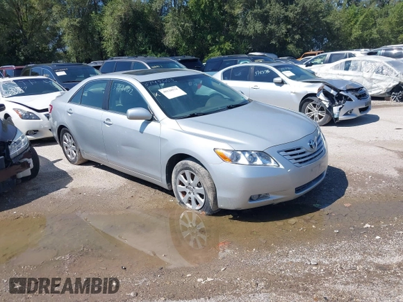 2007 Toyota Camry LE with VIN 4T1BK46K47U500034, listed as a IAAI auction lot 40120574 with 137,418 mi miles and . Bid and sale history available at DreamBid. Image 1.