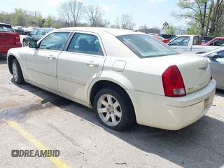 2006 Chrysler 300 with VIN 2C3LA43R16H250237, listed as a IAAI auction lot 42002745 with 157,911 mi miles. Bid and sale history available at carsss.com. Image 3.