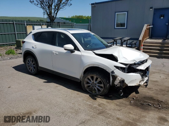 2020 Mazda CX-5 Grand Touring with VIN JM3KFBDM7L1851699, listed as a Copart auction lot 56475715 with Not Provided miles and Salvage Title. Bid and sale history available at DreamBid. Image 4.