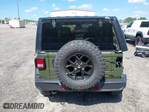 2024 Jeep Wrangler Willys with VIN 1C4PJXDG8RW236725, listed as a IAAI auction lot 39128397 with 50 mi miles and . Bid and sale history available at DreamBid. Image 17.