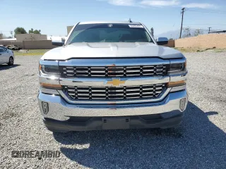 2016 Chevrolet Silverado 1500 LT with VIN 1GCRCREC7GZ307340, listed as a Copart auction lot 50203405 with 55,823 mi miles and Salvage Title. Bid and sale history available at DreamBid. Image 5.