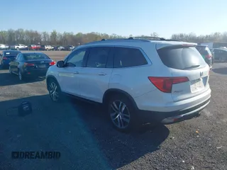 2017 Honda Pilot Elite with VIN 5FNYF6H00HB032386, listed as a IAAI auction lot 41976702 with 153,251 mi miles and . Bid and sale history available at DreamBid. Image 3.