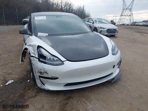2021 Tesla Model 3 Performance with VIN 5YJ3E1EC5MF059625, listed as a IAAI auction lot 41652748 with 63,287 mi miles. Bid and sale history available at carsss.com. Image 19.