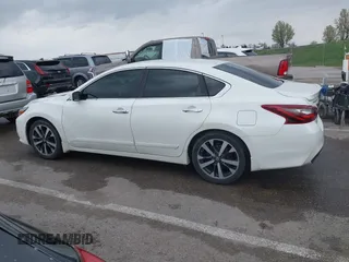 2017 Nissan Altima SR with VIN 1N4AL3AP0HN345977, listed as a IAAI auction lot 41937530 with 121,292 mi miles and . Bid and sale history available at carsss.com. Image 14.