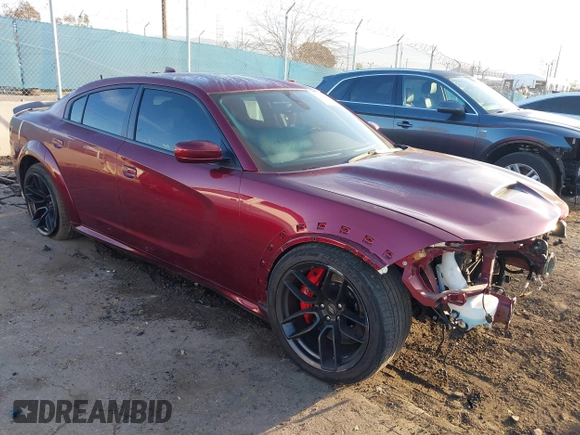2022 Dodge Charger Scat Pack Widebody with VIN 2C3CDXGJ5NH189146, listed as a IAAI auction lot 41603805 with 30,212 mi miles and . Bid and sale history available at DreamBid. Image 1.