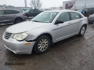 2010 Chrysler Sebring Touring z VIN 1C3CC4FB5AN128652, wystawiony jako IAAI lot #41863619 z przebiegiem 123 698 mil mil oraz . Historia ofert i sprzedaży dostępna na DreamBid. Obrazek 16.