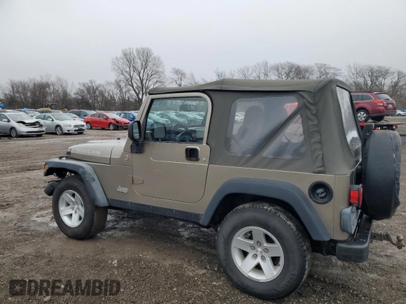2004 Jeep Wrangler Rubicon with VIN 1J4FA69S24P743345, listed as a Copart auction lot 87067154 with 153,783 mi miles and Salvage Title. Bid and sale history available at carsss.com. Image 2.
