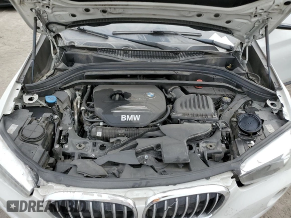 2018 BMW X1 sDrive28i with VIN WBXHU7C37J5H44386, listed as a Copart auction lot 42167135 with 96,668 mi miles and Salvage Title. Bid and sale history available at DreamBid. Image 12.