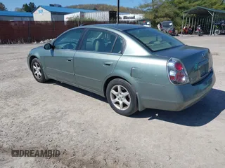 2006 Nissan Altima 2.5 S with VIN 1N4AL11D16C152112, listed as a IAAI auction lot 42048500 with 166,384 mi miles. Bid and sale history available at carsss.com. Image 3.