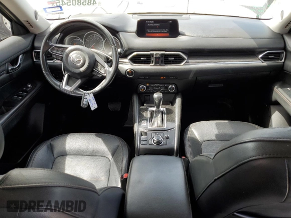 2018 Mazda CX-5 Grand Touring with VIN JM3KFBDM8J0474819, listed as a Copart auction lot 48580545 with 76,917 mi miles and Salvage Title. Bid and sale history available at DreamBid. Image 8.