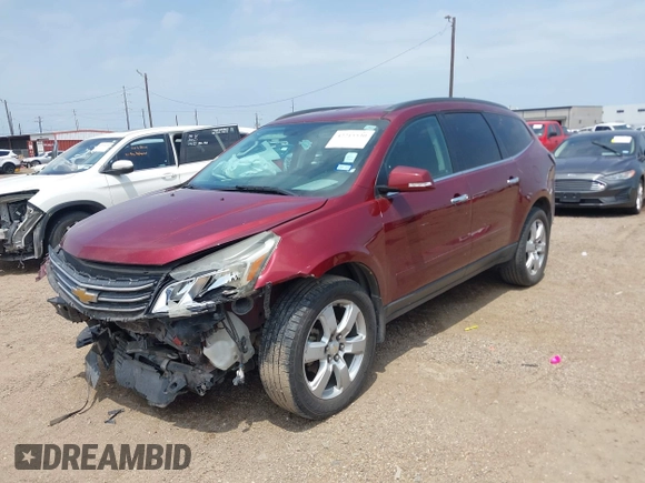 2016 Chevrolet Traverse LT with VIN 1GNKRGKD0GJ185766, listed as a IAAI auction lot 42215530 with 131,834 mi miles and . Bid and sale history available at DreamBid. Image 2.