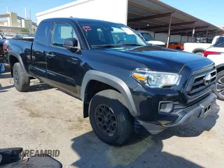 2020 Toyota Tacoma SR z VIN 3TYRZ5CN7LT000455, wystawiony jako IAAI lot #42313072 z przebiegiem 43 815 mil mil oraz . Historia ofert i sprzedaży dostępna na DreamBid. Obrazek 1.