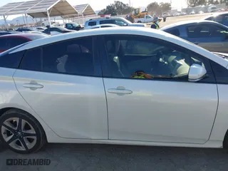 2016 Toyota Prius Four with VIN JTDKARFU5G3018734, listed as a IAAI auction lot 41825707 with 111,564 mi miles. Bid and sale history available at carsss.com. Image 14.