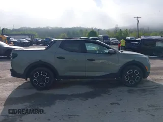 2022 Hyundai Santa Cruz SEL z VIN 5NTJCDAE8NH024149, wystawiony jako IAAI lot #42197663 z przebiegiem 51 491 mil mil oraz . Historia ofert i sprzedaży dostępna na DreamBid. Obrazek 13.