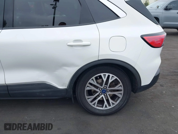 2020 Ford Escape SEL with VIN 1FMCU0H62LUB20143, listed as a IAAI auction lot 42058158 with 159,233 mi miles and . Bid and sale history available at DreamBid. Image 6.