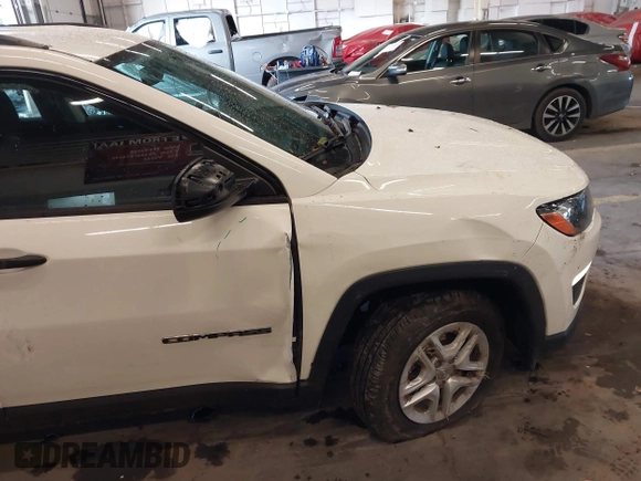 2018 Jeep Compass Sport with VIN 3C4NJCAB6JT124198, listed as a IAAI auction lot 41192196 with 104,557 mi miles. Bid and sale history available at carsss.com. Image 20.