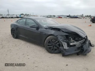 2023 Tesla Model S z VIN 5YJSA1E58PF531166, wystawiony jako Copart lot #51827565 z przebiegiem Nie podano mil oraz Szkoda całkowita • Salvage title. Historia ofert i sprzedaży dostępna na DreamBid. Obrazek 4.