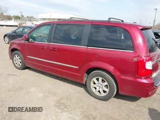 2012 Chrysler Town & Country Touring with VIN 2C4RC1BG5CR400323, listed as a IAAI auction lot 41902471 with 999,999 mi miles. Bid and sale history available at carsss.com. Image 3.