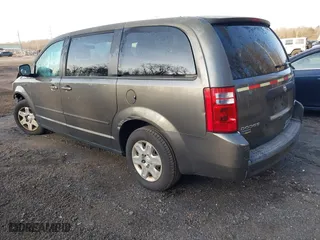 2010 Dodge Grand Caravan SE with VIN 2D4RN4DE7AR397092, listed as a IAAI auction lot 41084684 with 117,747 mi miles. Bid and sale history available at carsss.com. Image 3.