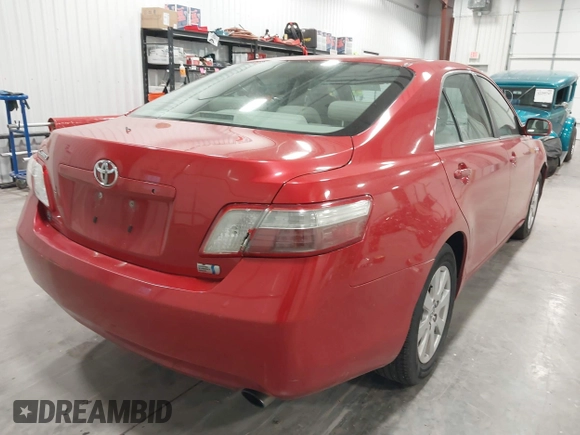 2007 Toyota Camry z VIN 4T1BB46K97U002556, wystawiony jako IAAI lot #42191026 z przebiegiem 255 391 mil mil oraz . Historia ofert i sprzedaży dostępna na DreamBid. Obrazek 4.