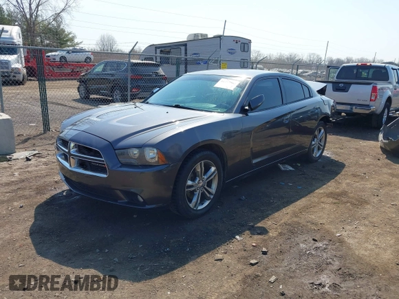 2014 Dodge Charger SXT Plus with VIN 2C3CDXJG0EH104680, listed as a IAAI auction lot 41784303 with 135,771 mi miles. Bid and sale history available at carsss.com. Image 2.
