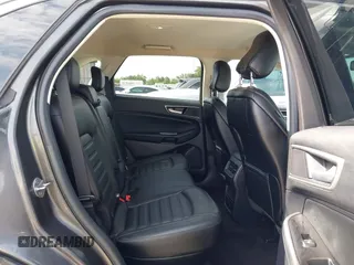 2020 Ford Edge SEL z VIN 2FMPK3J9XLBA54556, wystawiony jako IAAI lot #42179907 z przebiegiem 63 449 mil mil oraz . Historia ofert i sprzedaży dostępna na DreamBid. Obrazek 8.
