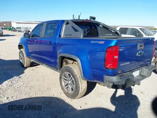 2018 Chevrolet Colorado 4WD ZR2 with VIN 1GCPTEE10J1288344, listed as a IAAI auction lot 40966394 with 118,056 mi miles. Bid and sale history available at carsss.com. Image 3.