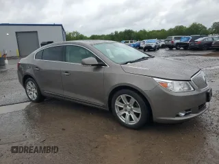 2012 Buick LaCrosse Premium 2 z VIN 1G4GF5E3XCF353906, wystawiony jako Copart lot #57954945 z przebiegiem 110 484 mil mil oraz Szkoda całkowita • Salvage title. Historia ofert i sprzedaży dostępna na DreamBid. Obrazek 4.