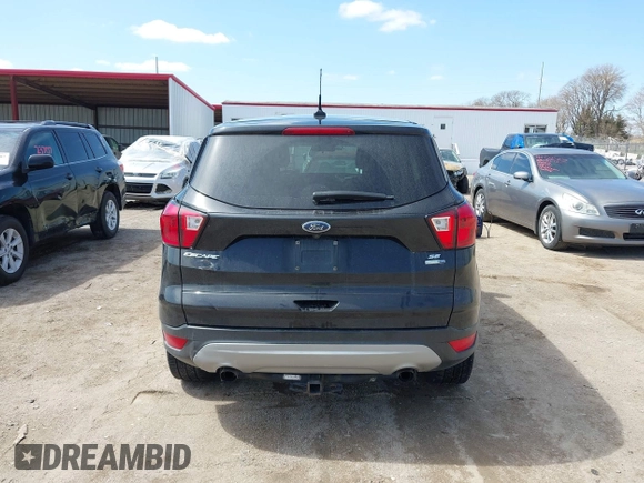 2019 Ford Escape SE z VIN 1FMCU9GDXKUB78598, wystawiony jako IAAI lot #41930913 z przebiegiem 111 284 mil mil oraz . Historia ofert i sprzedaży dostępna na DreamBid. Obrazek 16.