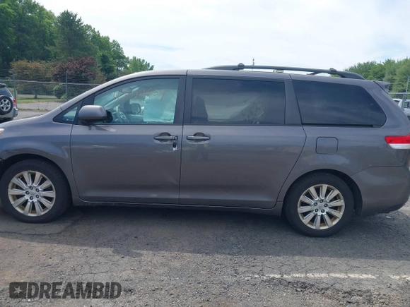 2011 Toyota Sienna XLE with VIN 5TDDK3DC8BS028176, listed as a IAAI auction lot 42592654 with 161,992 mi miles and . Bid and sale history available at DreamBid. Image 14.