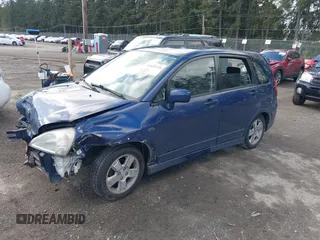 2002 Suzuki Aerio SX z VIN JS2RC41H825105469, wystawiony jako IAAI lot #41829735 z przebiegiem Nie podano mil oraz . Historia ofert i sprzedaży dostępna na DreamBid. Obrazek 2.