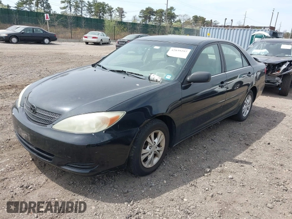 2004 Toyota Camry LE with VIN 4T1BF32KX4U077010, listed as a IAAI auction lot 42039297 with 113,742 mi miles. Bid and sale history available at carsss.com. Image 2.