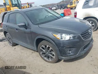 2016 Mazda CX-5 Grand Touring with VIN JM3KE4DY9G0845707, listed as a IAAI auction lot 41709685 with 96,351 mi miles. Bid and sale history available at carsss.com. Image 1.