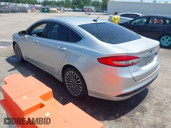 2017 Ford Fusion SE with VIN 3FA6P0HDXHR372203, listed as a IAAI auction lot 42392330 with 172,266 mi miles and . Bid and sale history available at DreamBid. Image 3.