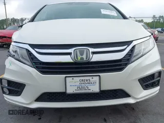2019 Honda Odyssey EX-L with VIN 5FNRL6H70KB083596, listed as a IAAI auction lot 42072667 with 153,087 mi miles and . Bid and sale history available at DreamBid. Image 6.