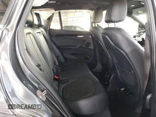 2017 BMW X1 sDrive28i with VIN WBXHU7C34HP924730, listed as a Copart auction lot 52245005 with 0 mi miles and Salvage Title. Bid and sale history available at carsss.com. Image 11.